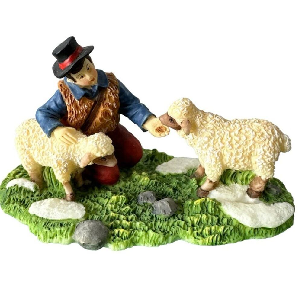 O'well Victorian Christmas village accessory man feeding sheep grass snow herder